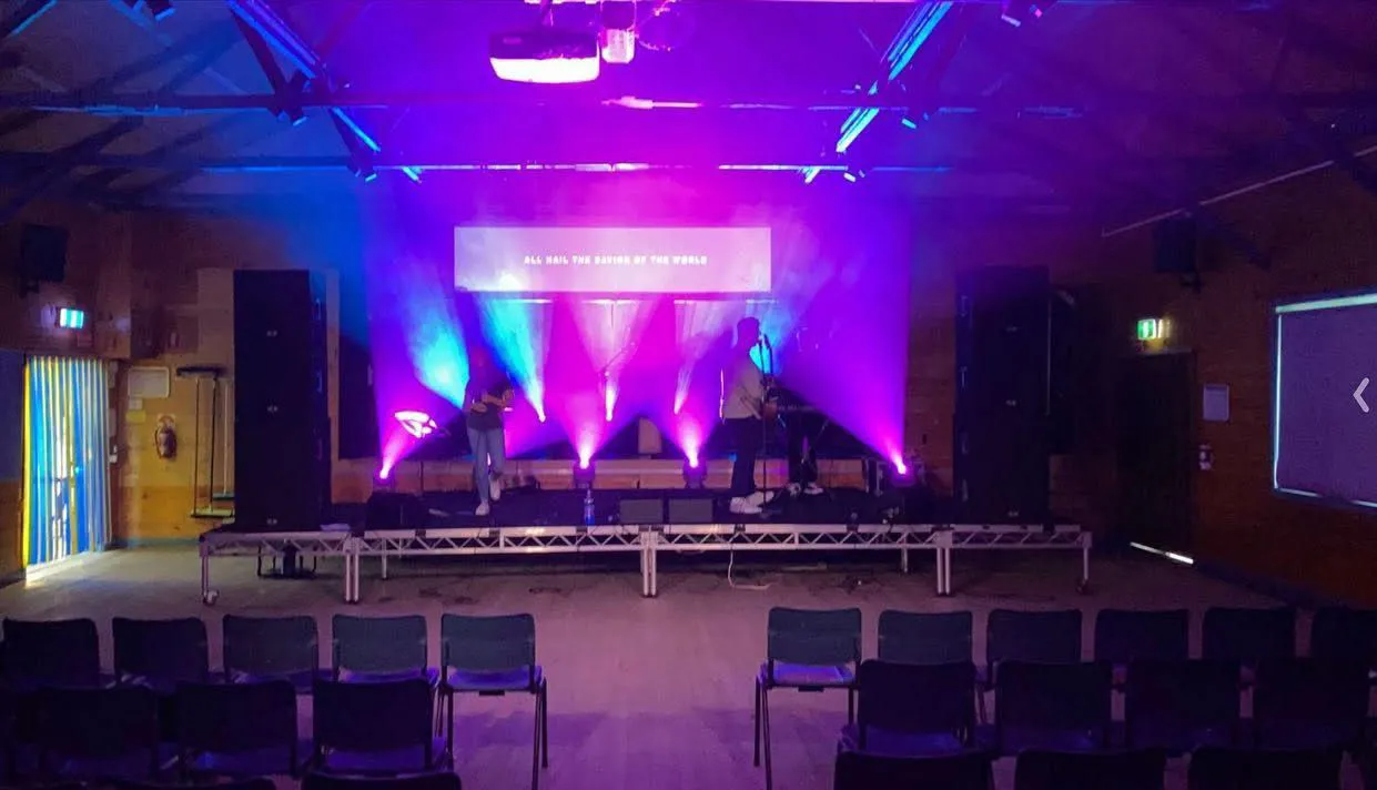 Sound and lighting check with blue and purple lights